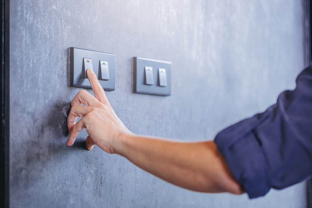 Close,Up,Of,Finger,Turn,Off,On,Light,Switch,At